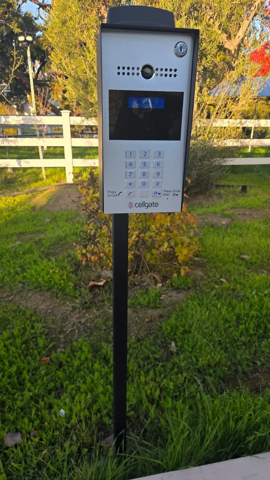 Cellgate cellular video intercom and keypad on a black post